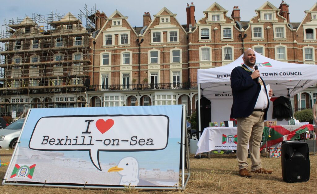 Cllr Memish Huseyin, Mayor of Bexhill-on-Sea, opens Bexhill Day from the Town Council gazebo. 