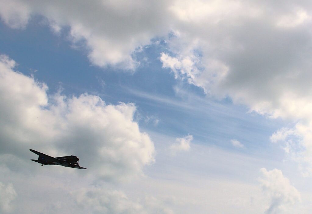 The Dakota aircraft completes its flyover past the Bexhill War Memorial.